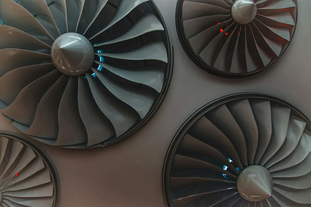 a group of three jet engines mounted to the side of a wall