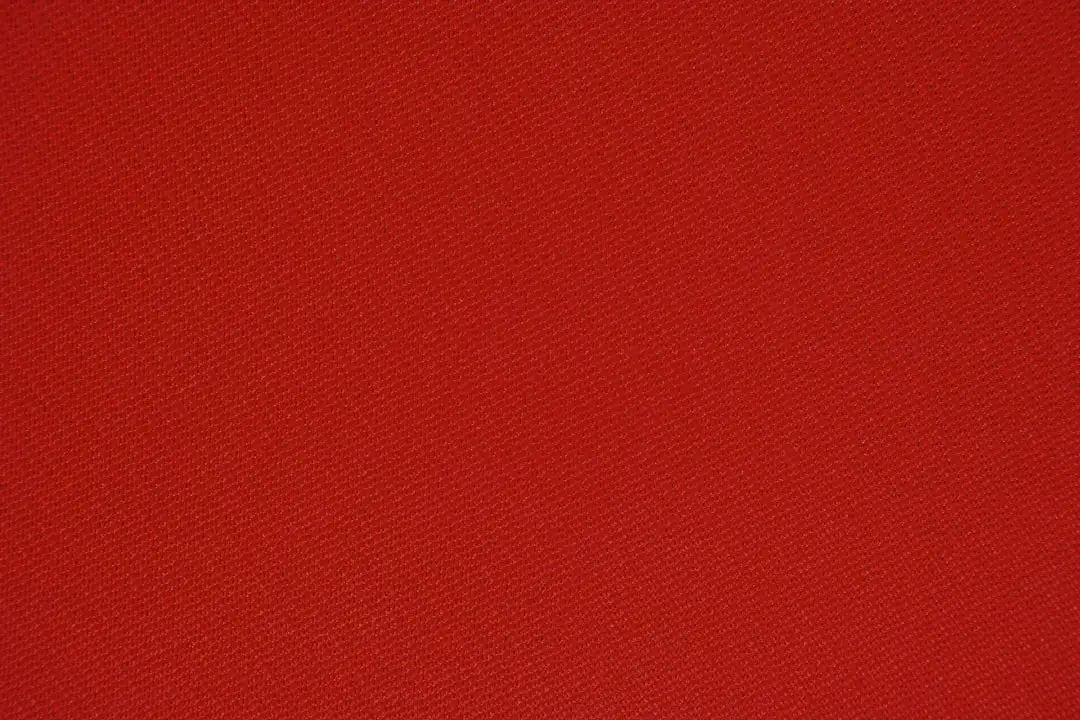 red textile in close up photography